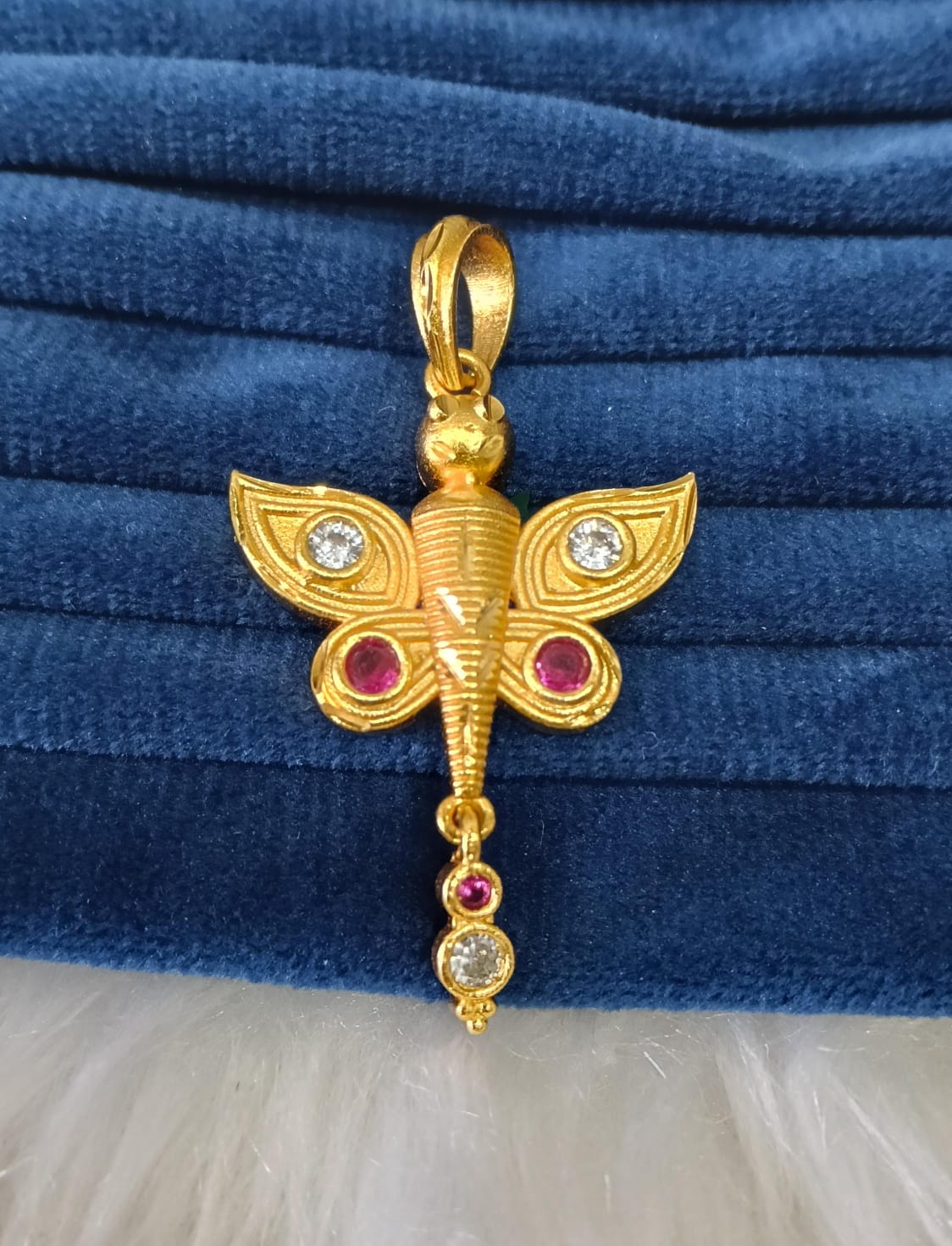 Gold plated pendant.