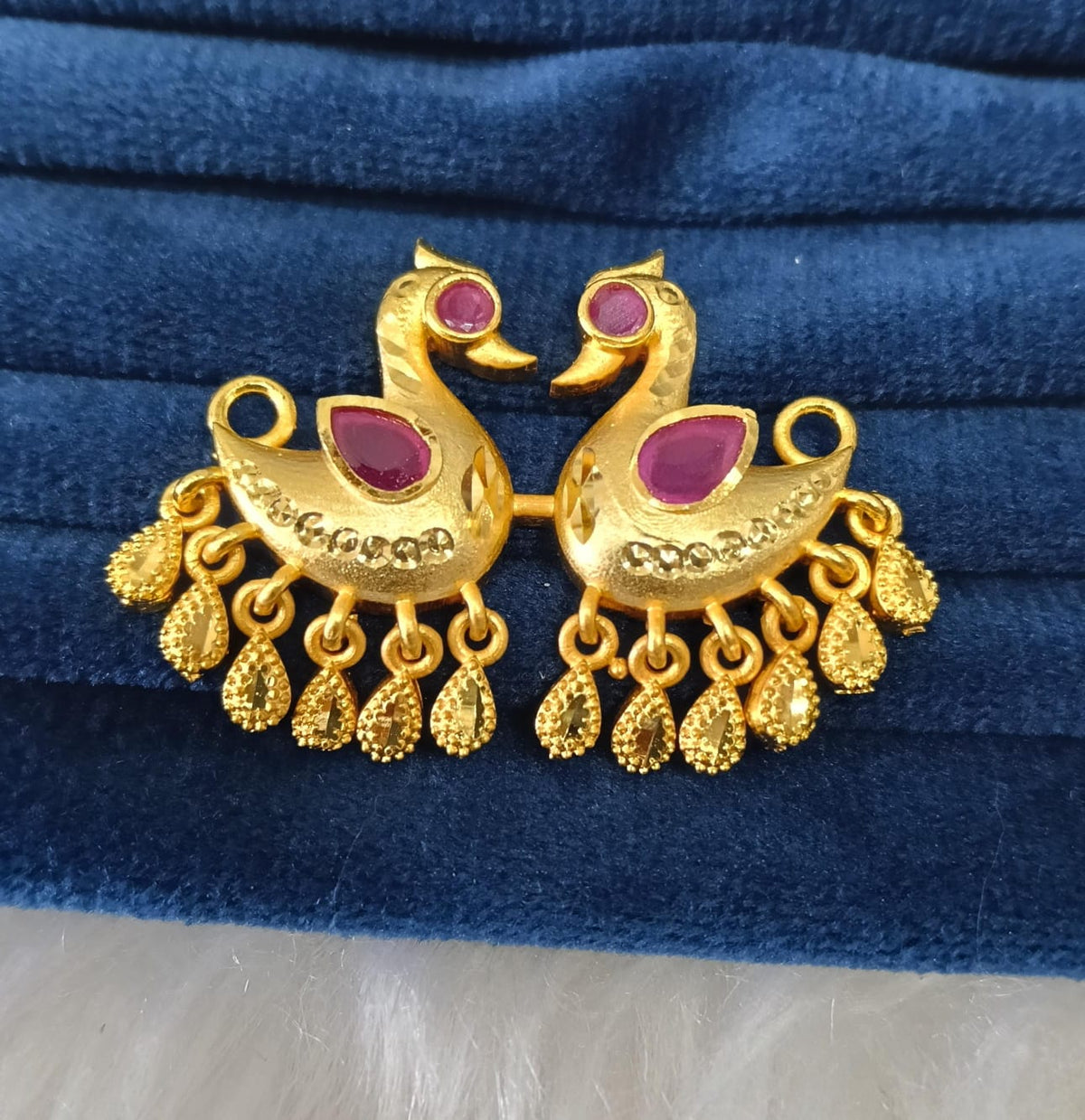 Gold plated pendant.