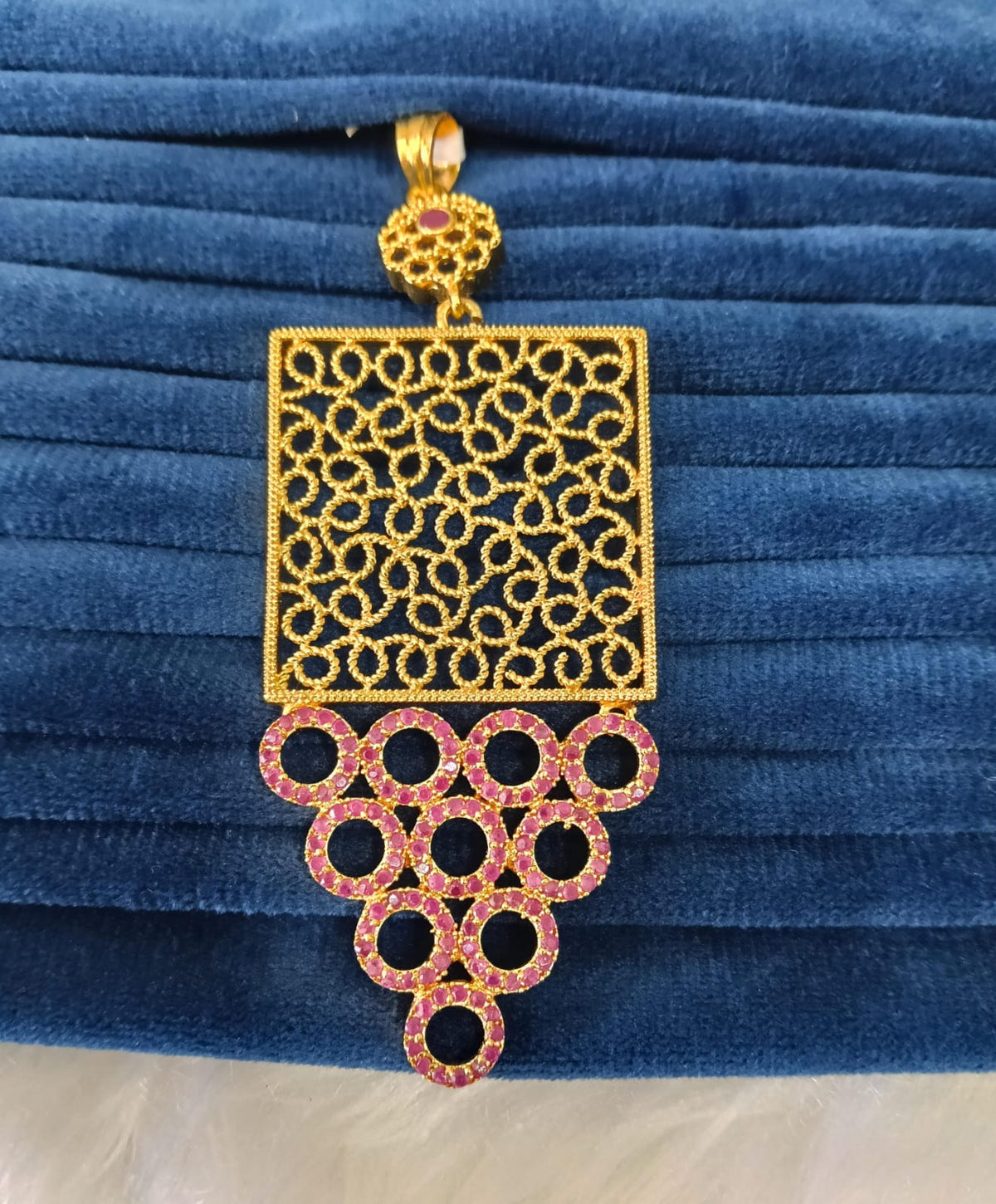 Gold plated AD pendant.