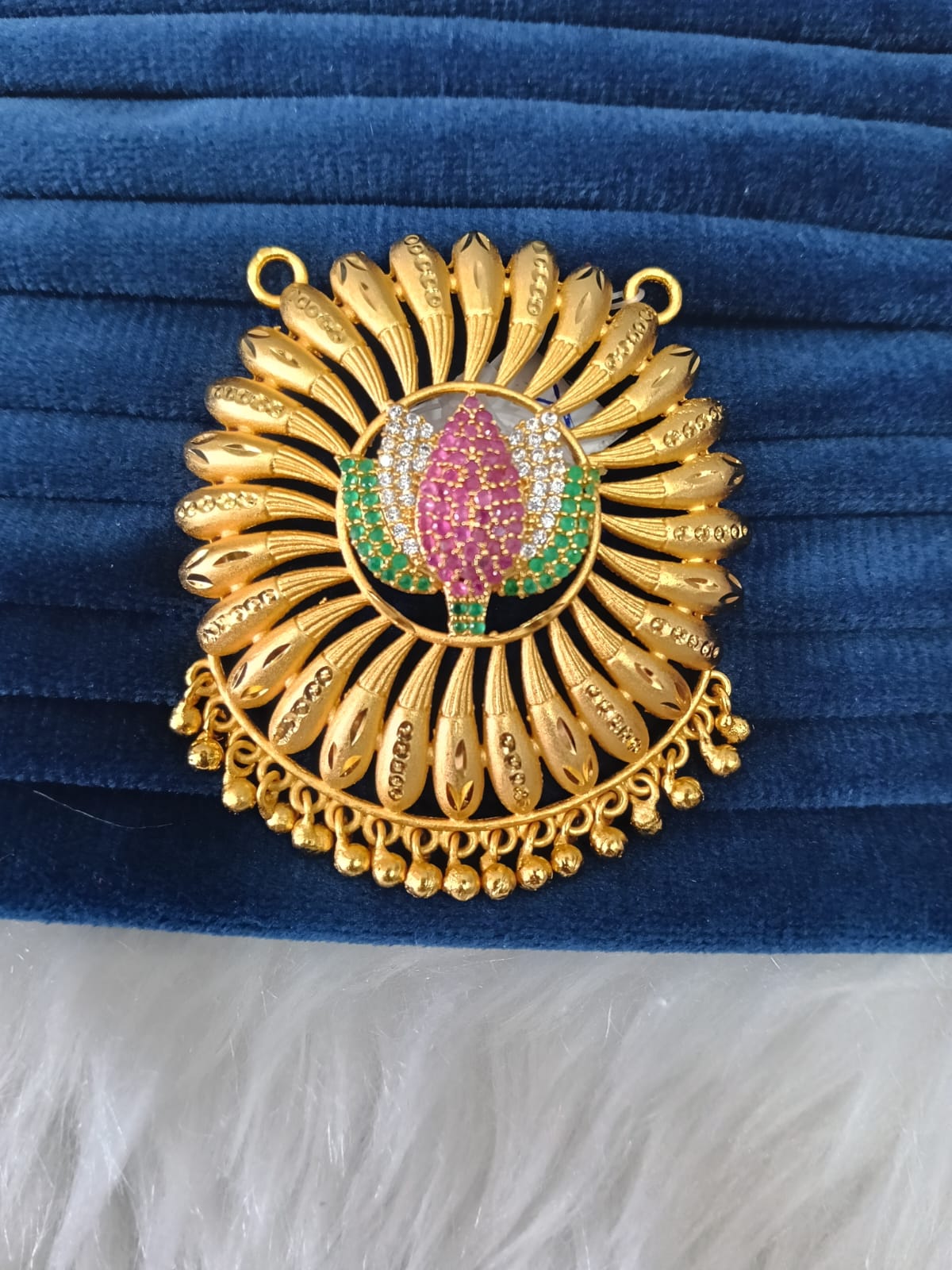 Gold plated pendant.