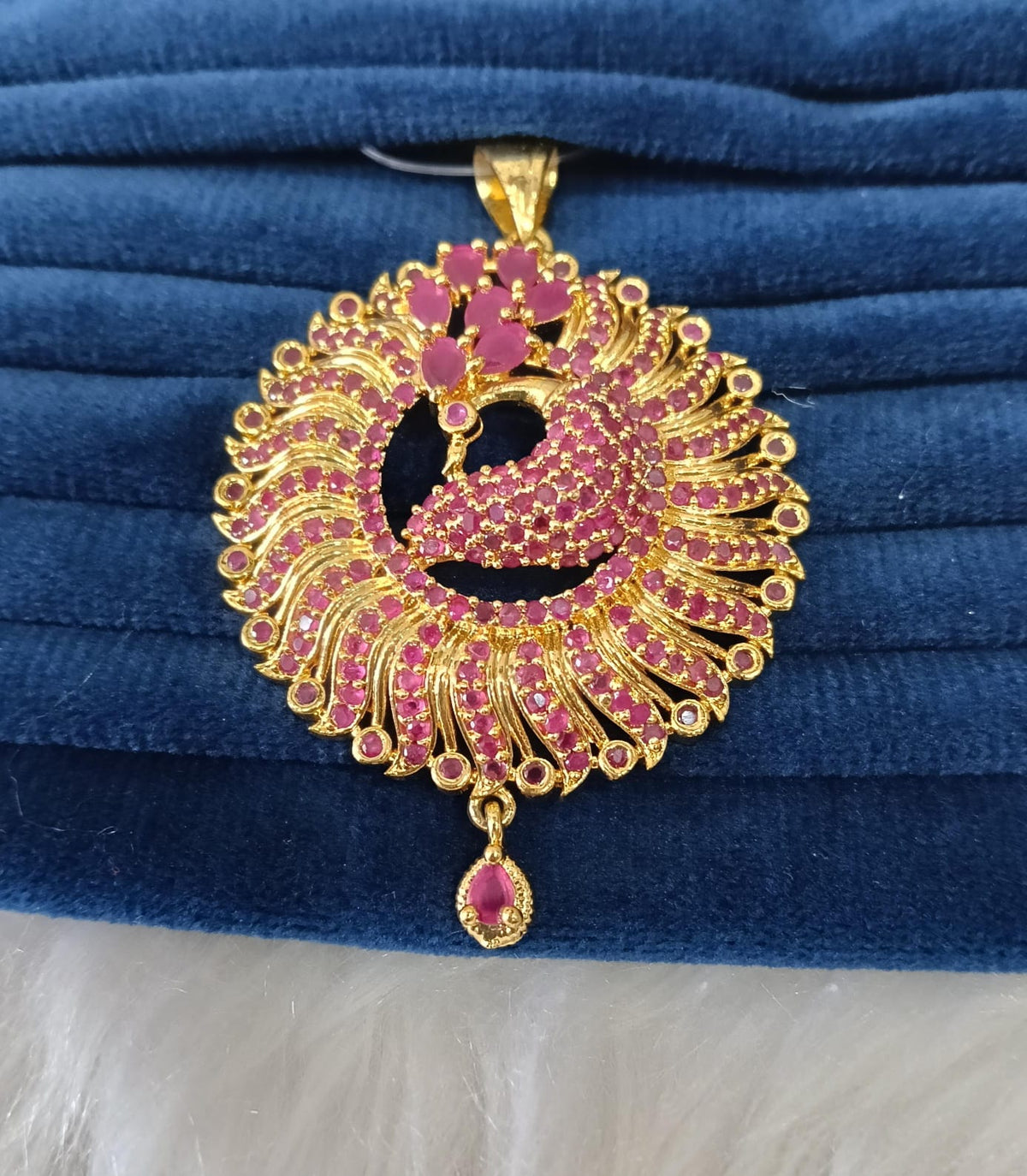 Gold plated AD pendant.