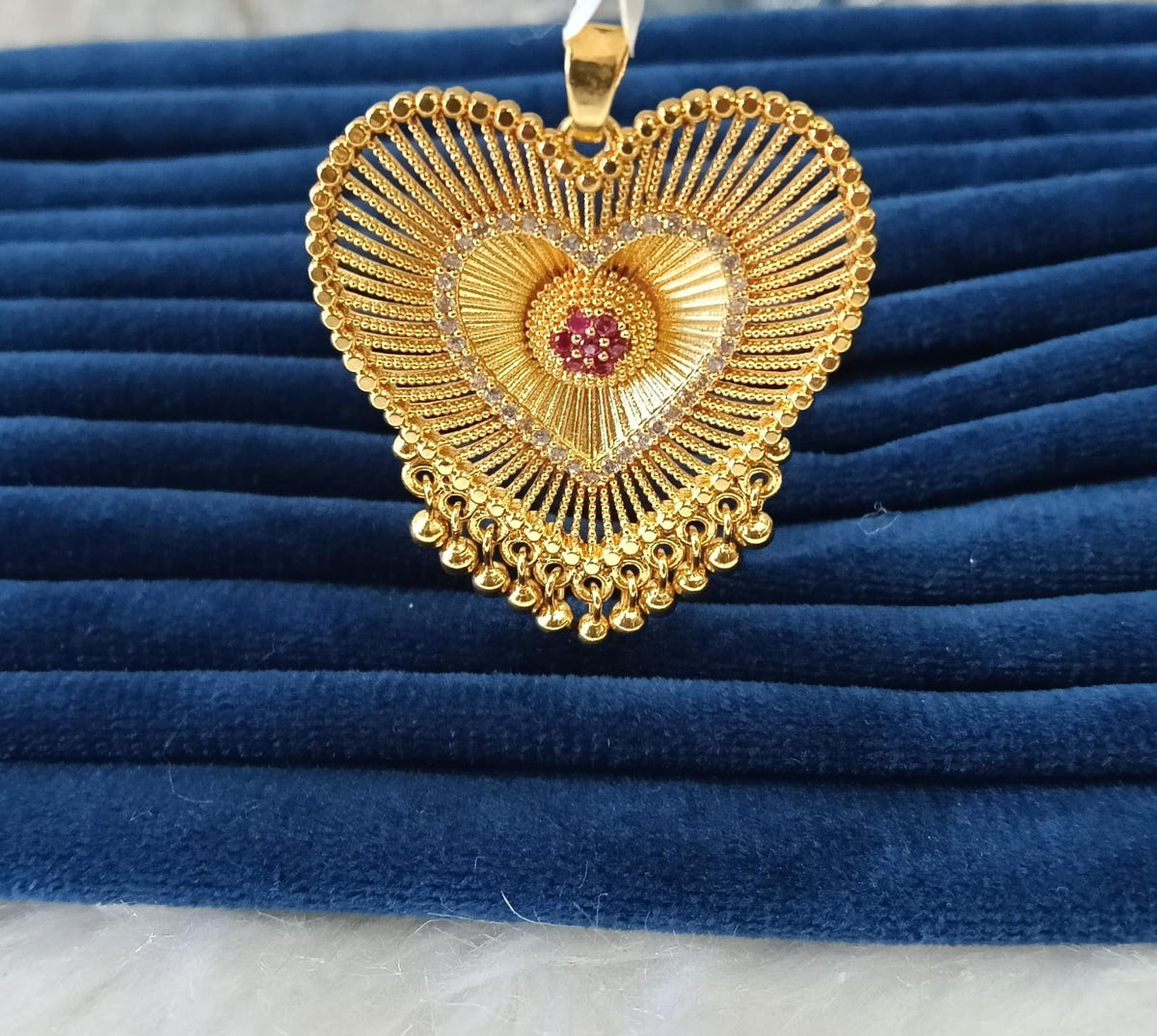 Gold plated pendant.
