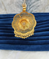 Gold plated pendant.