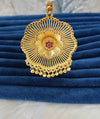Gold plated pendant.