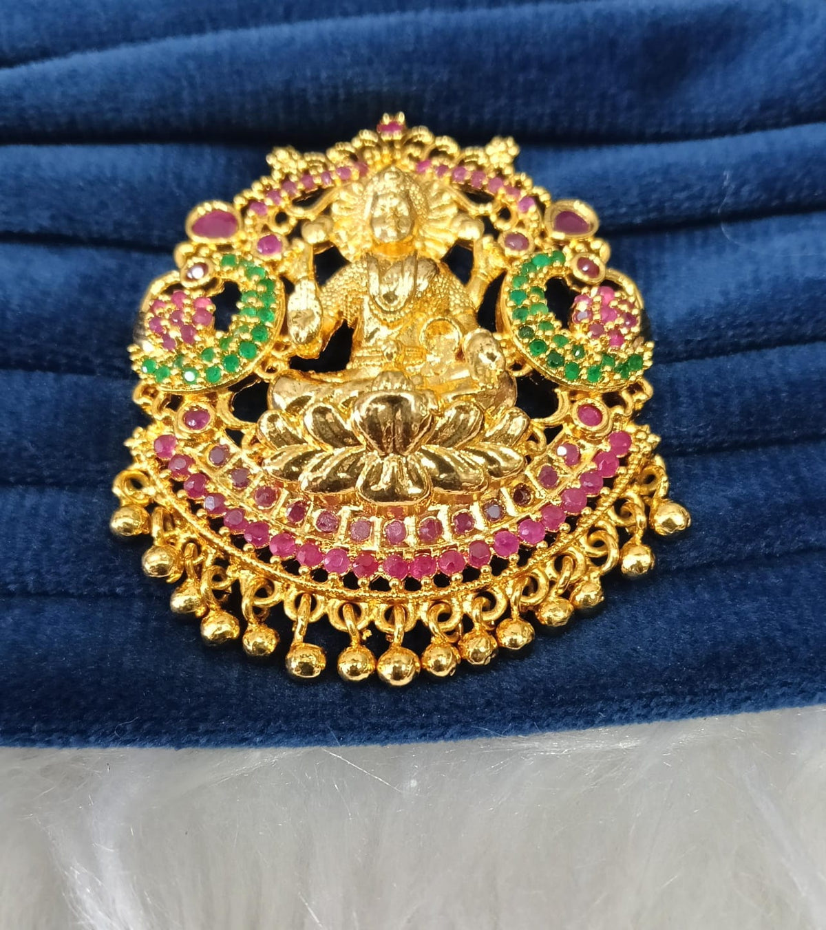 Gold plated AD pendant.