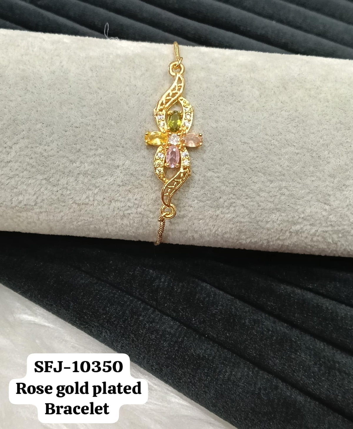 Gold plated AD bracelet.