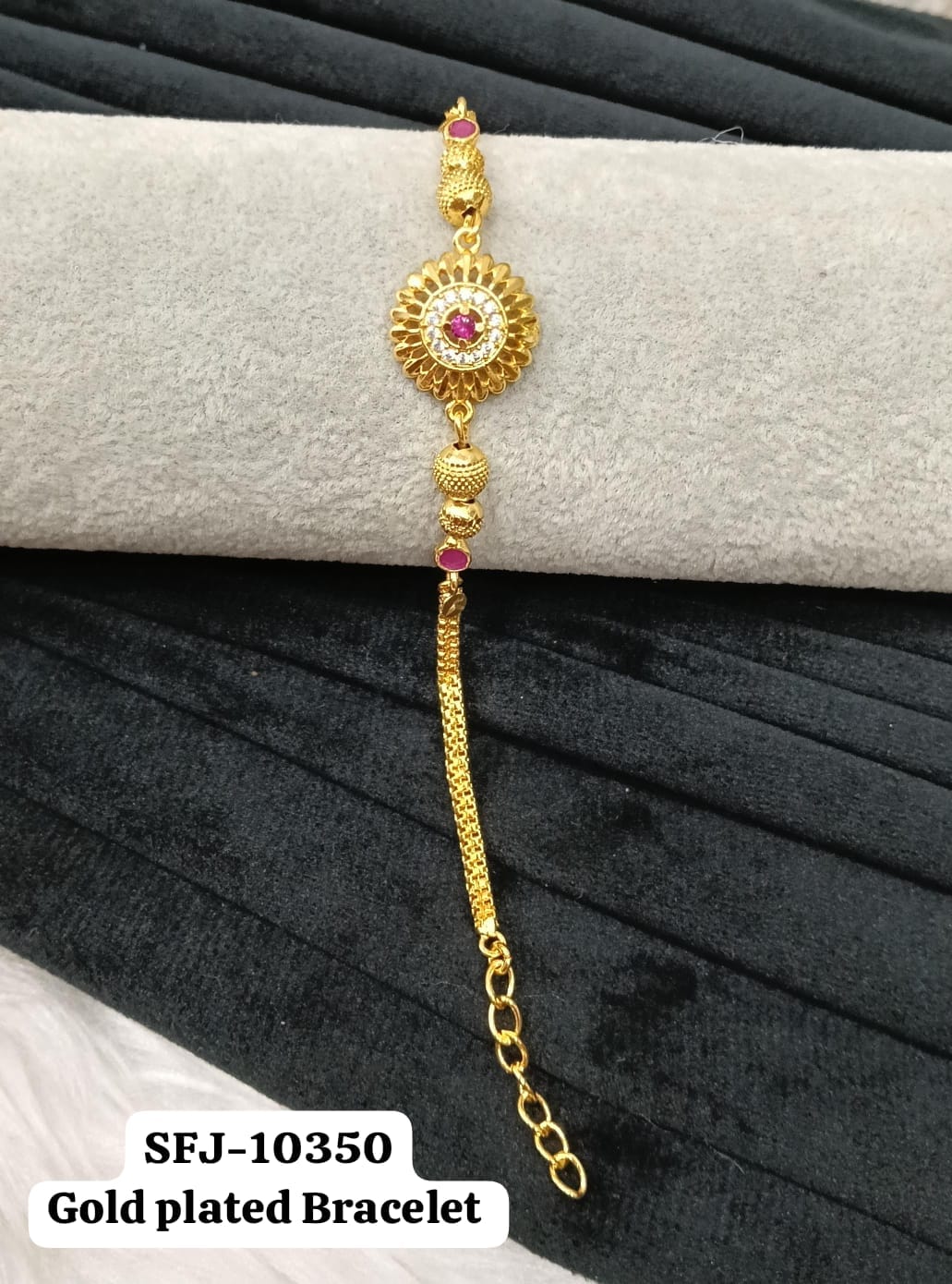 Gold plated bracelet.