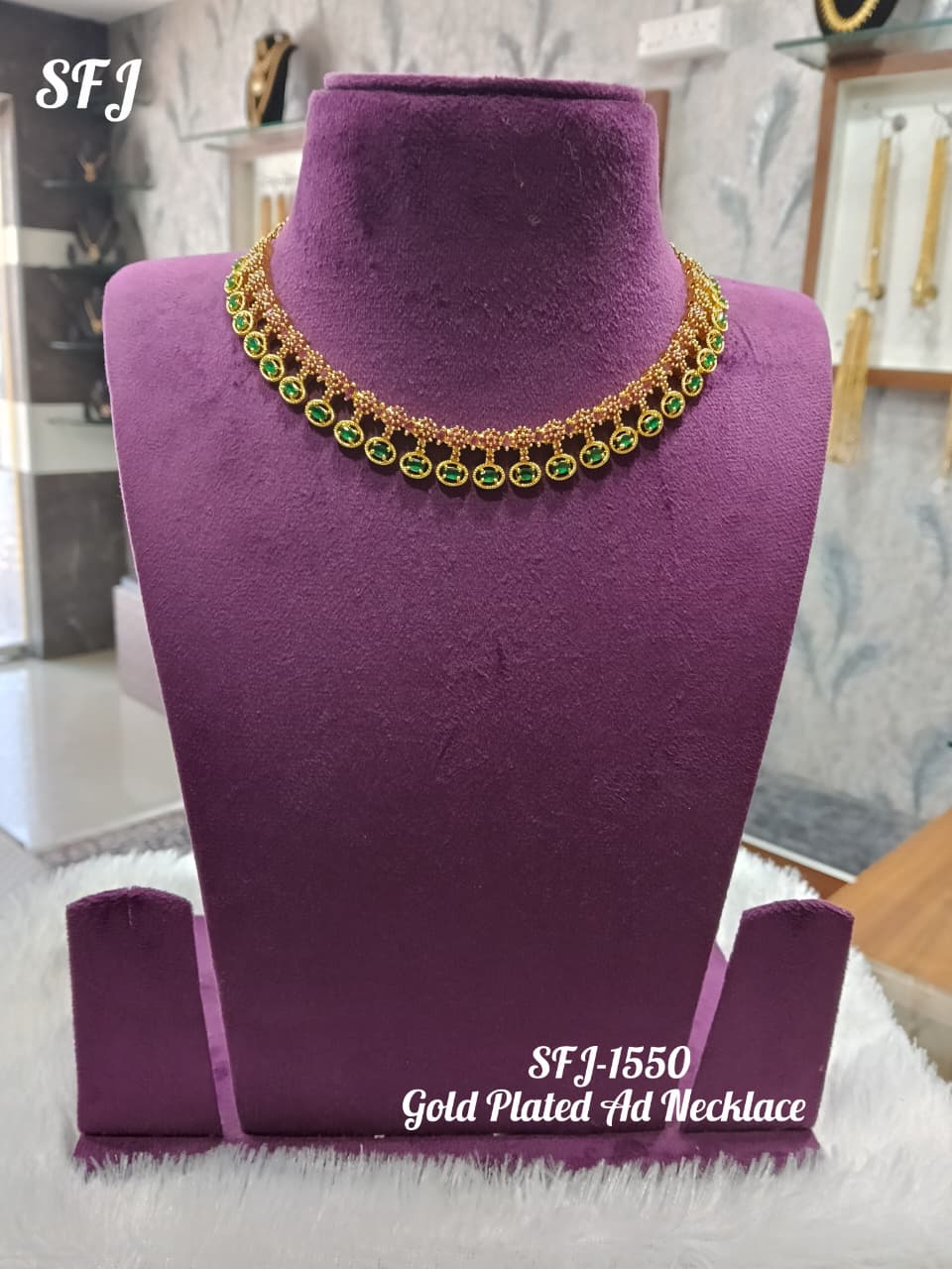 Gold plated AD necklace.