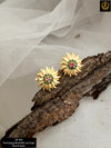 Gold plated stud.