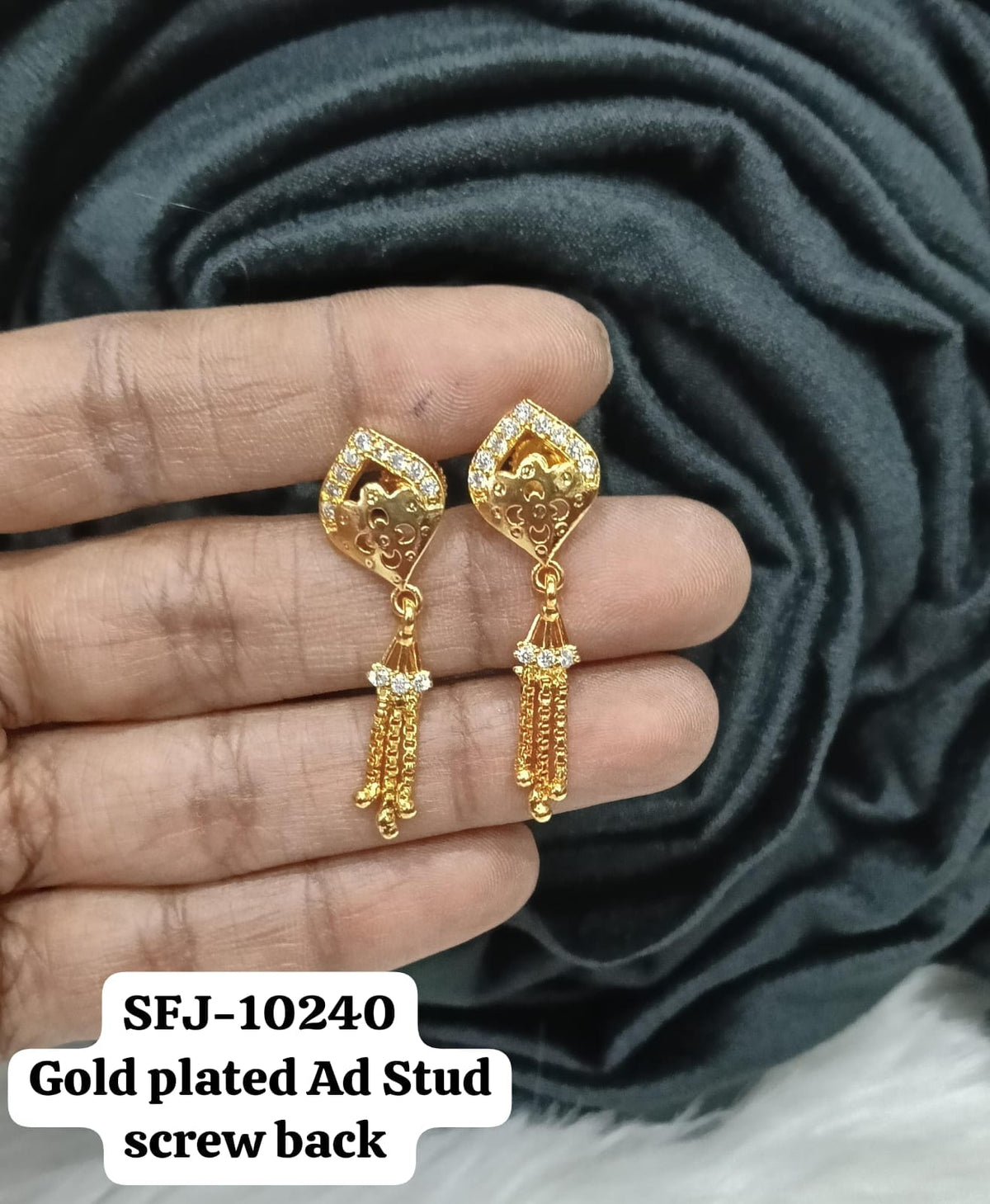 Gold plated earing.