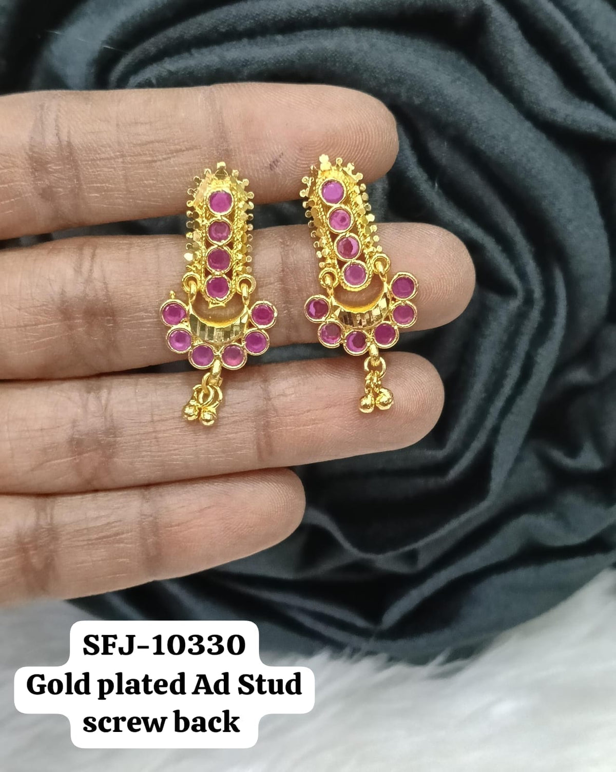 Gold plated earing.