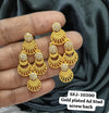 Gold plated earing.