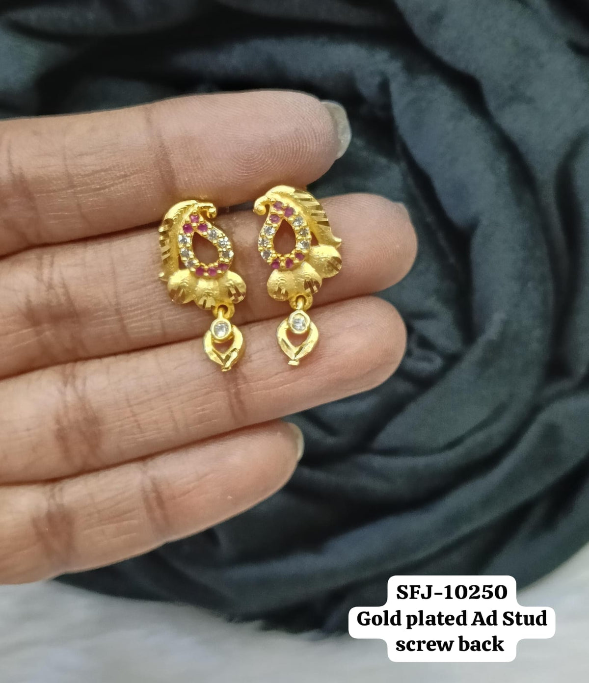 Gold plated stud.