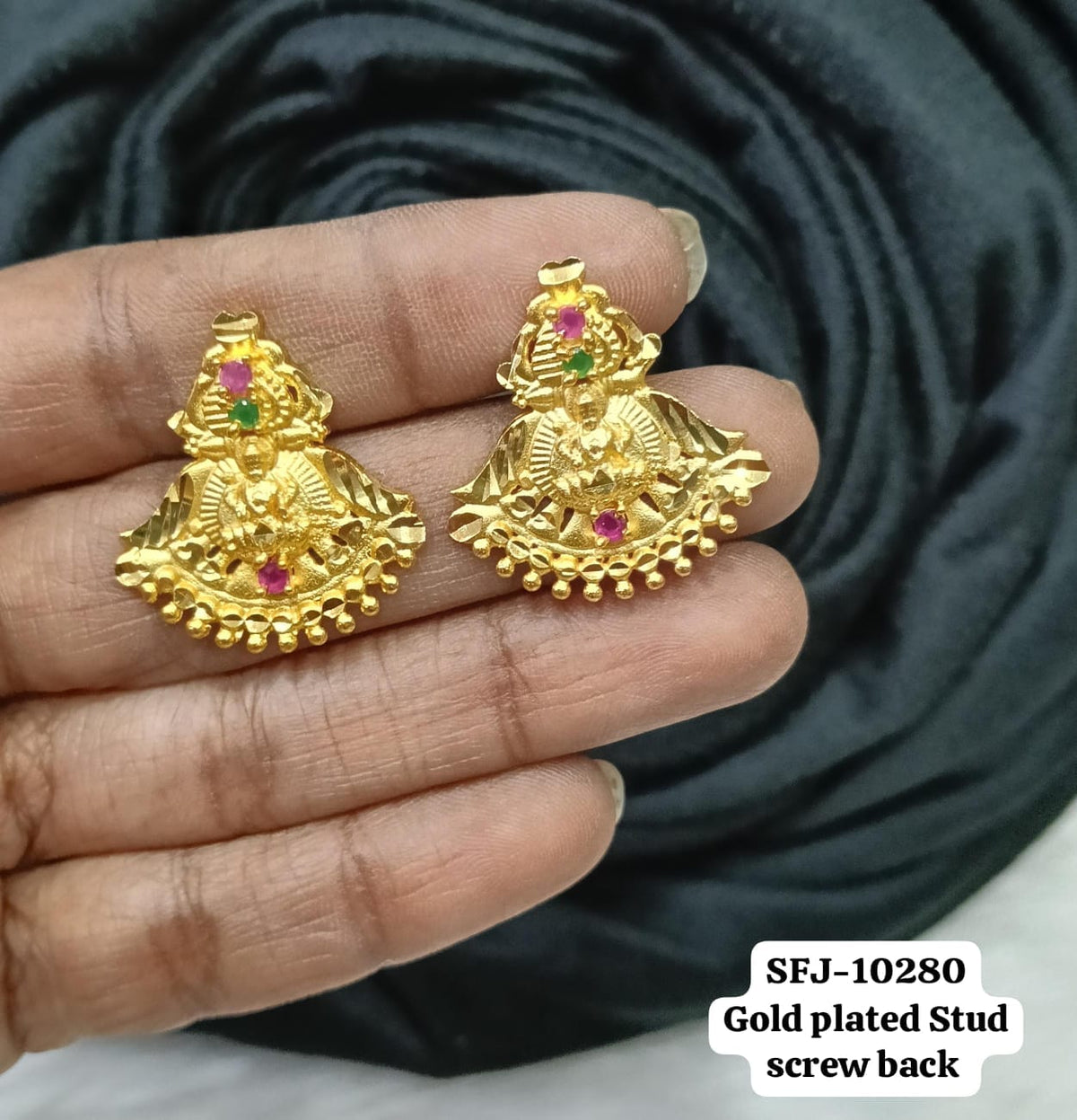 Gold plated earing.