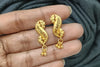Gold plated stud.