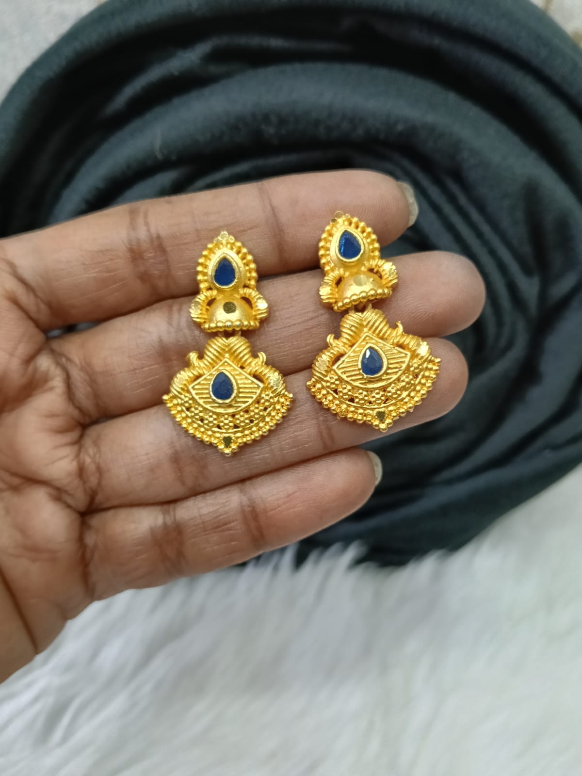 Gold plated earing.