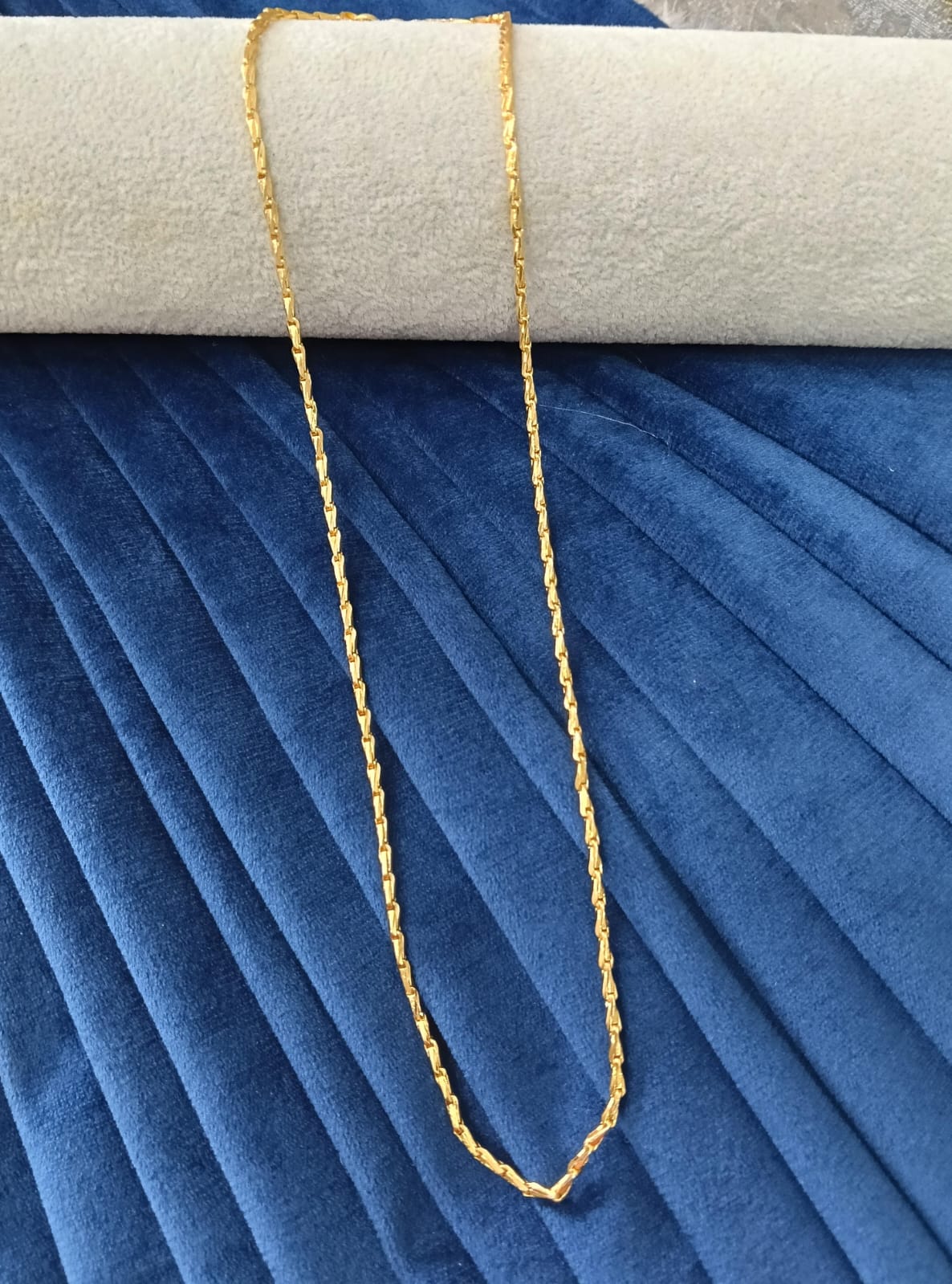 Gold plated chain.
