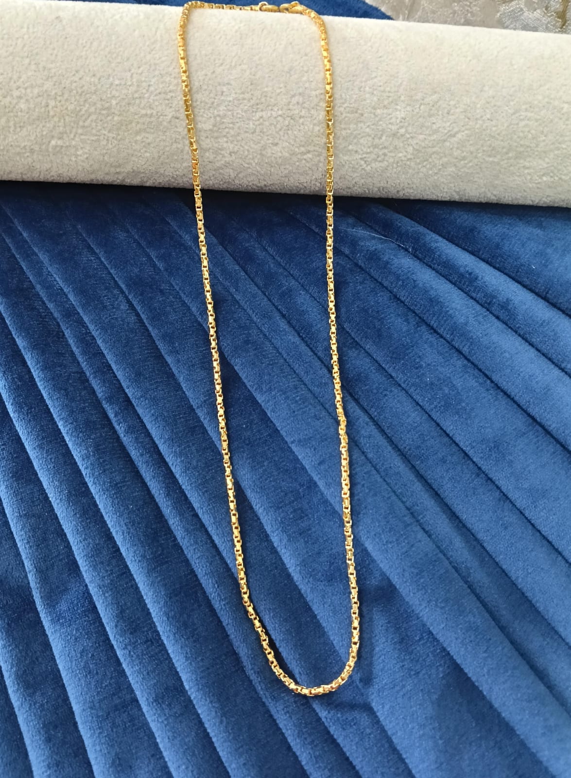 Gold plated chain.