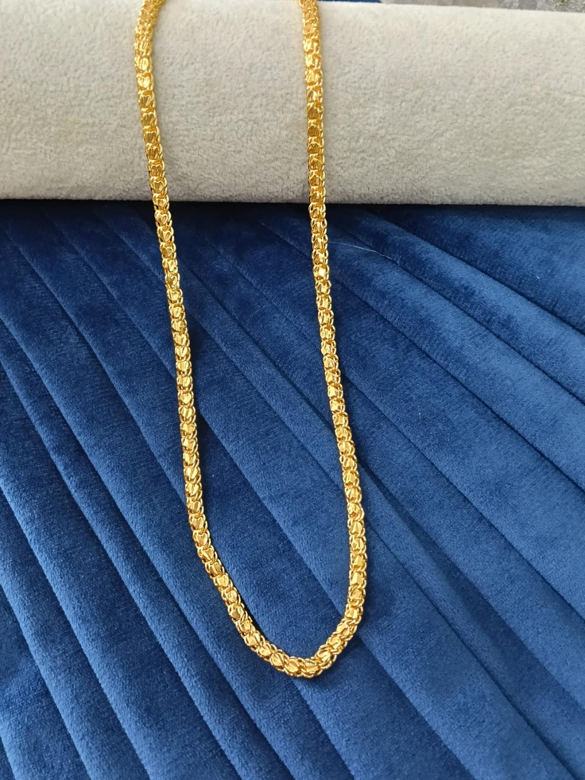 Gold plated chain.