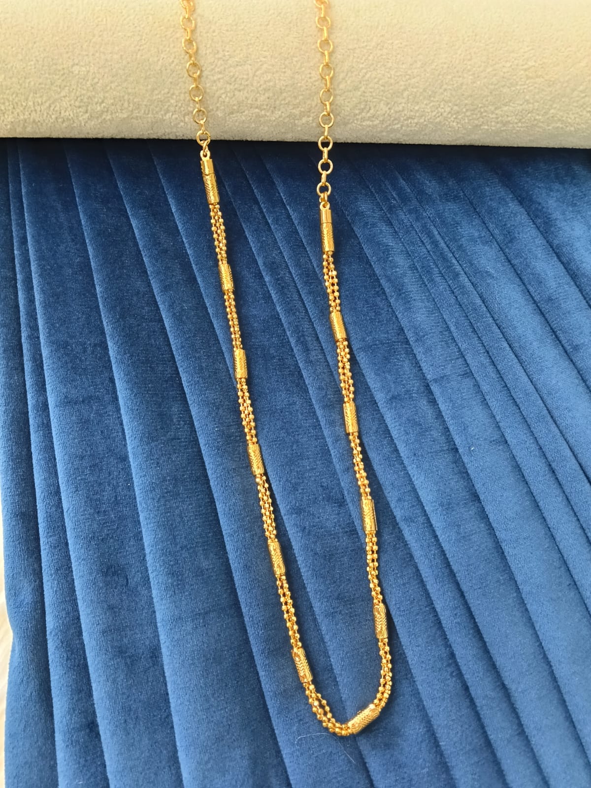 Gold plated chain.