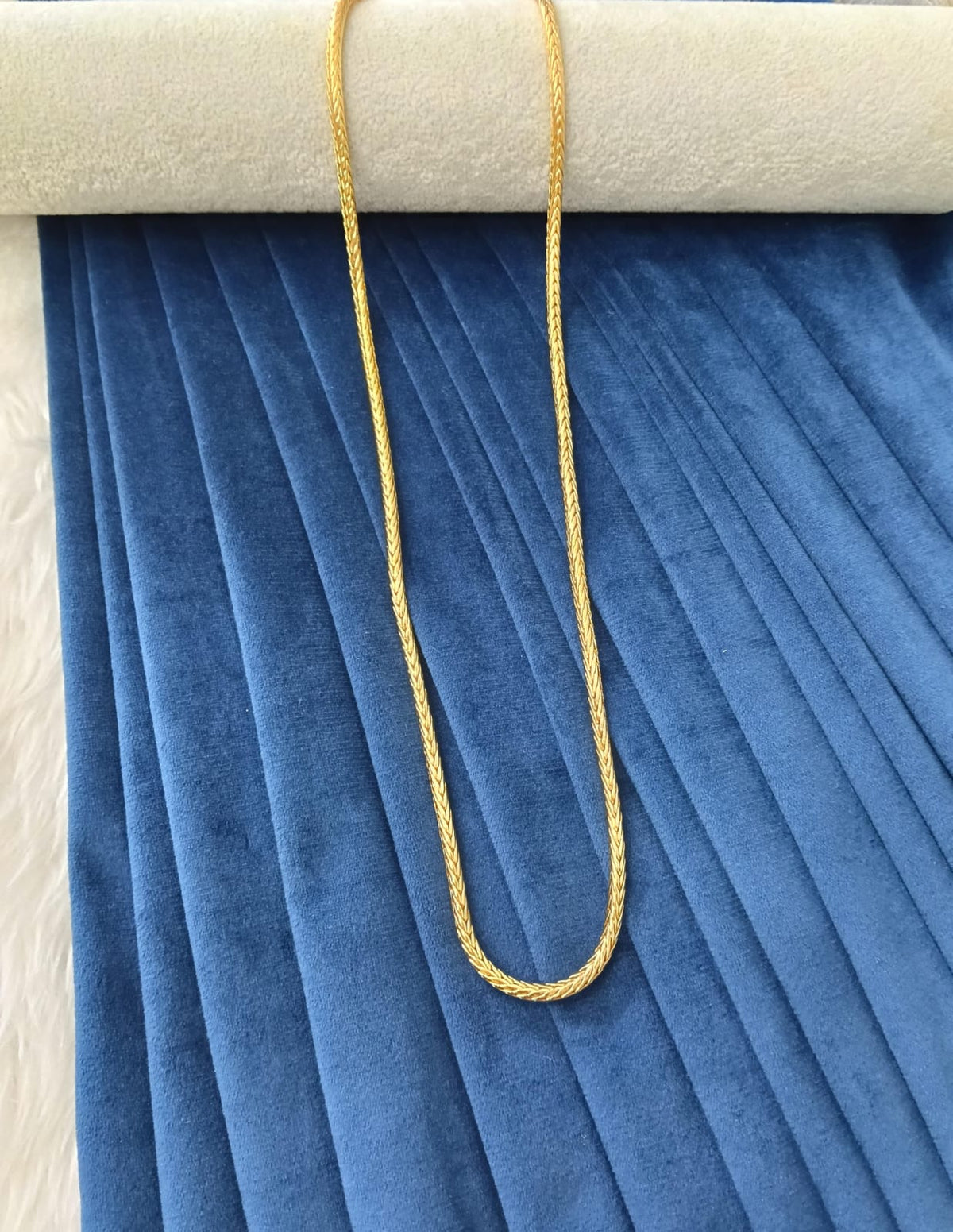 Gold plated chain.