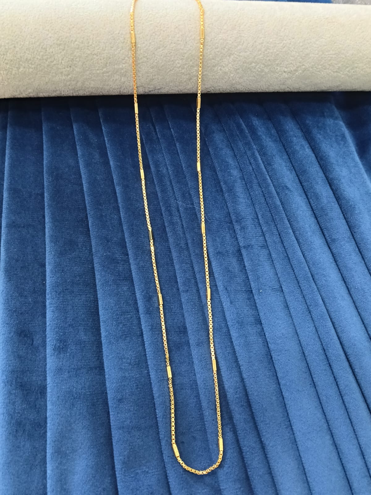 Gold plated chain.