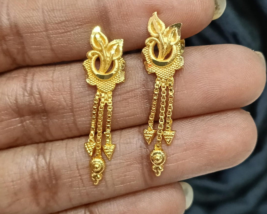 Gold plated earing.
