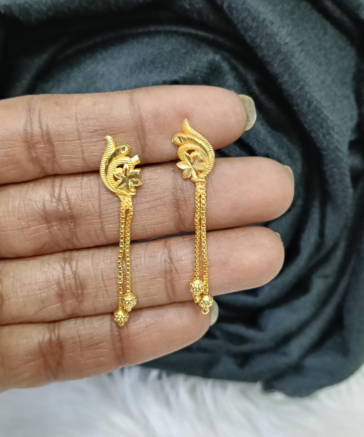 Gold plated earing.