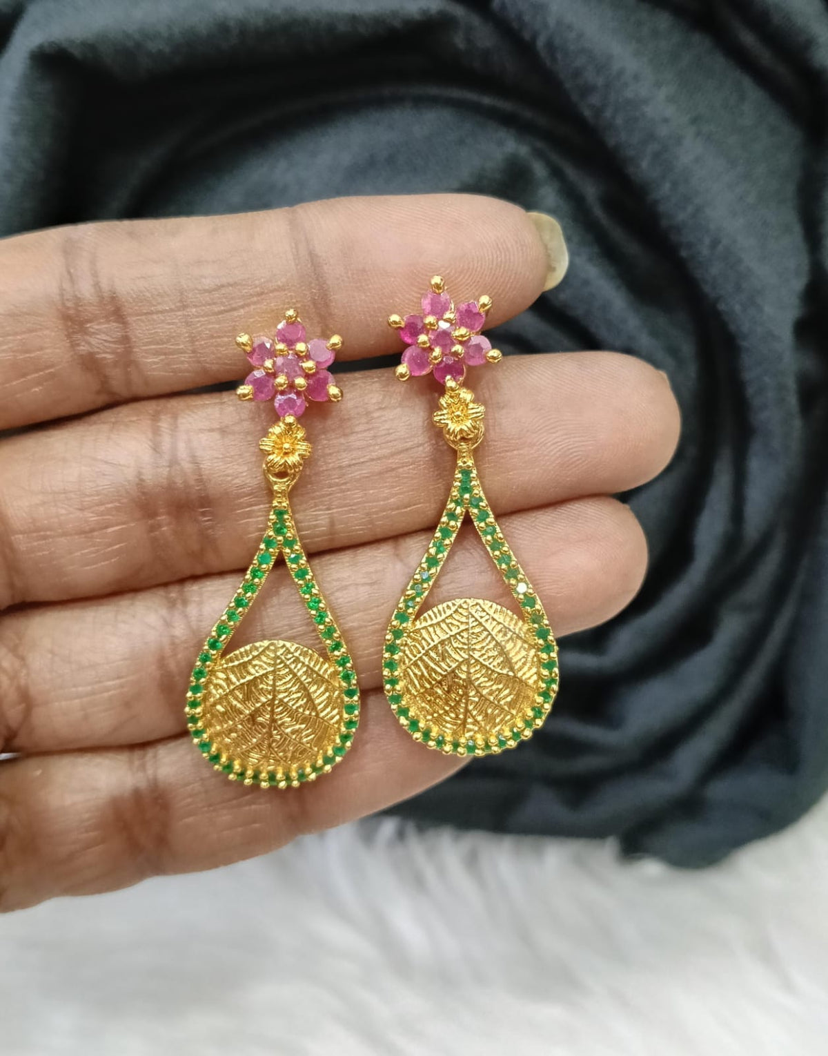 Gold plated earing.