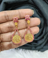 Gold plated earing.