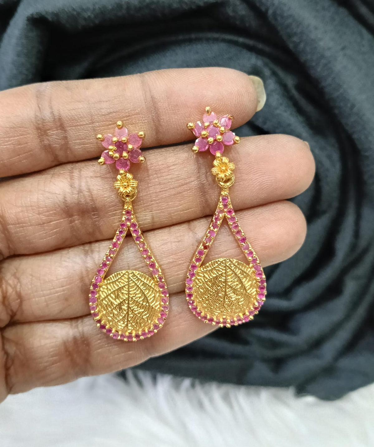 Gold plated earing.