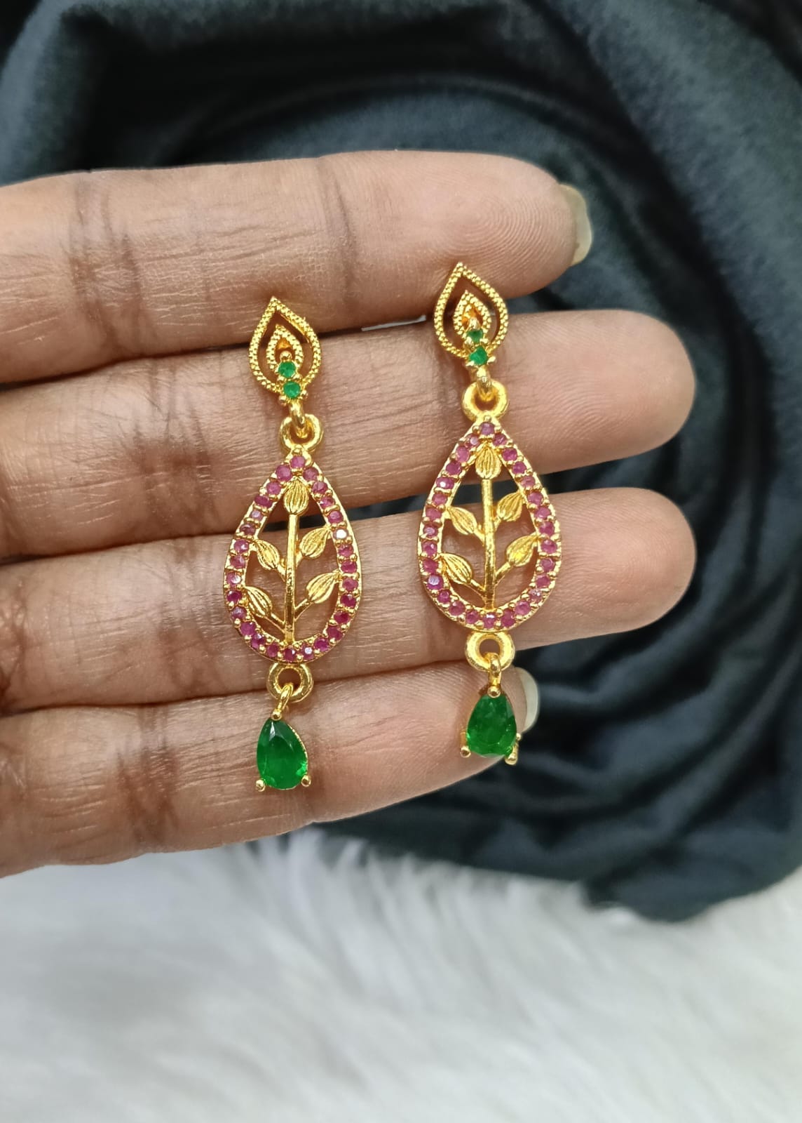 Gold plated earing.