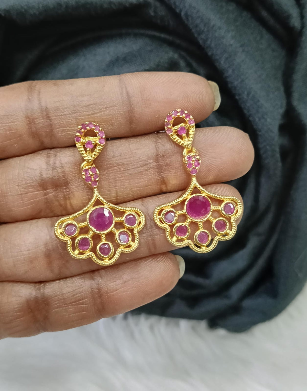 Gold plated earing.