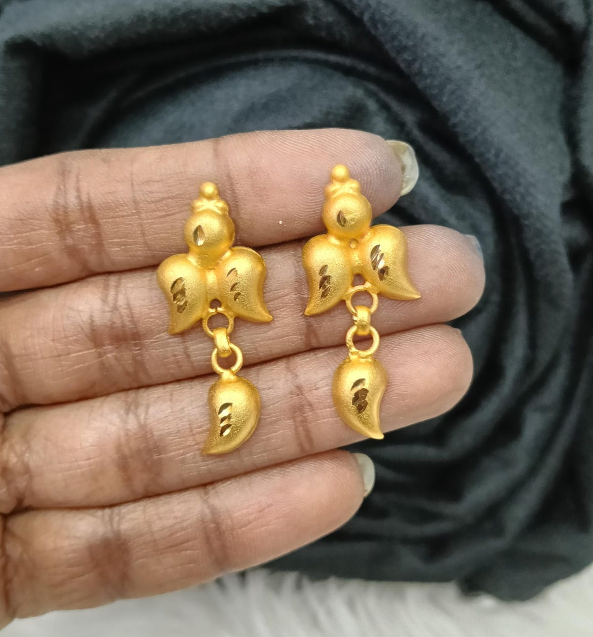 Gold plated earing.