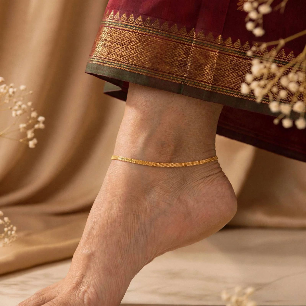 Gold plated anklet.