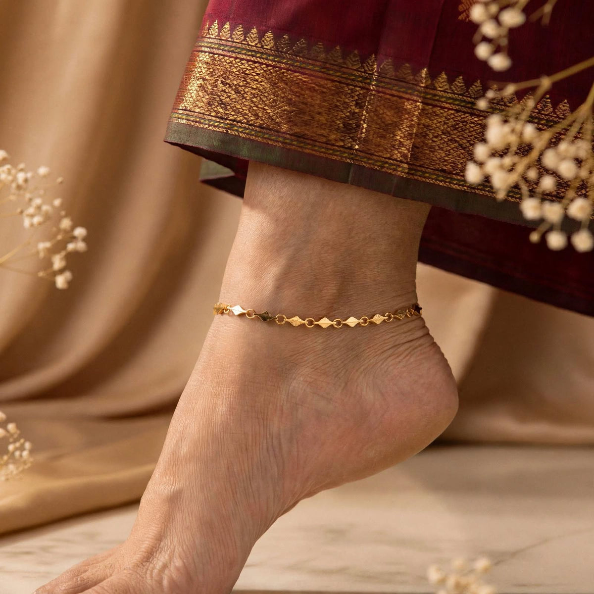 Gold plated anklet.