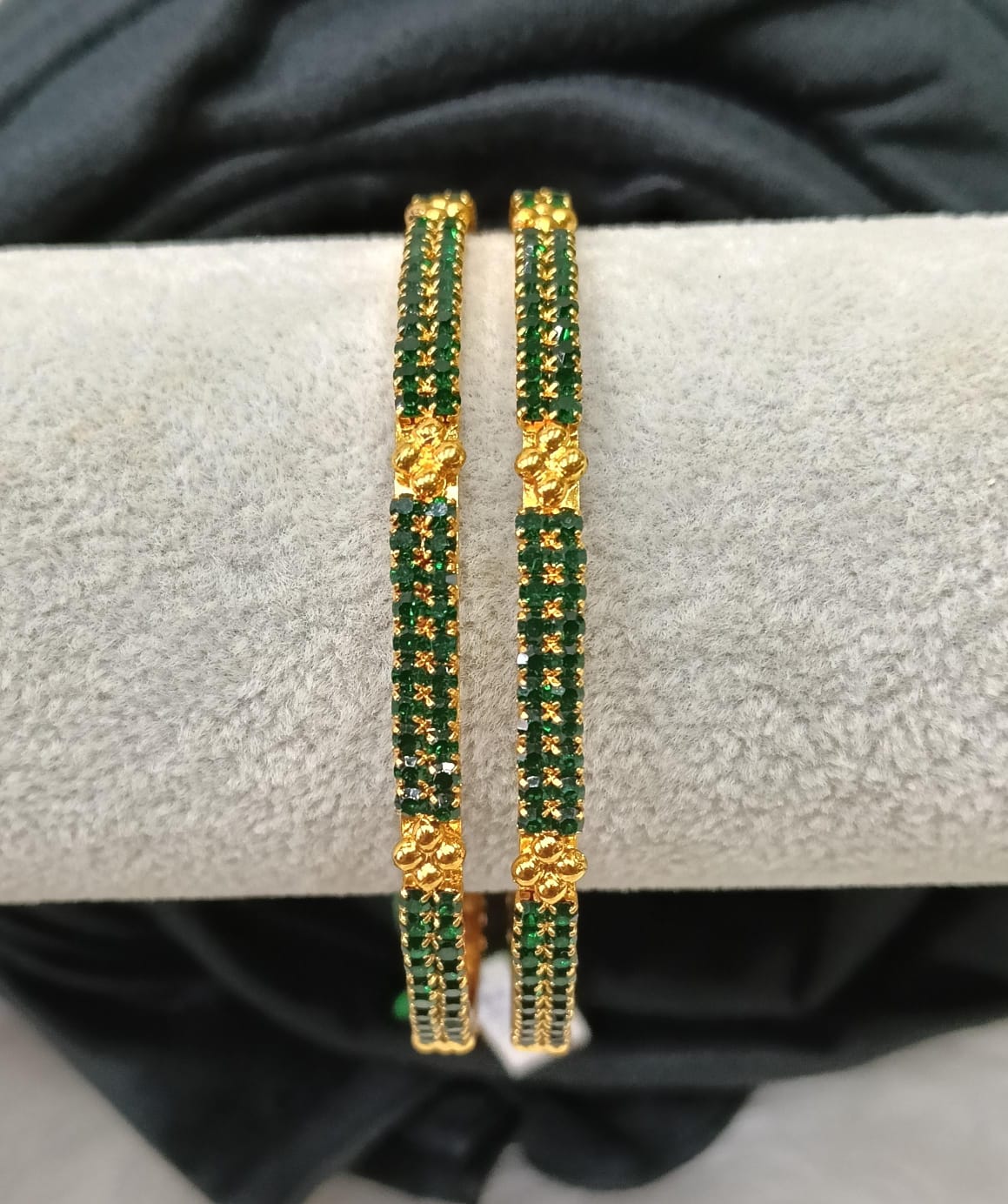 Gold plated AD bangle.