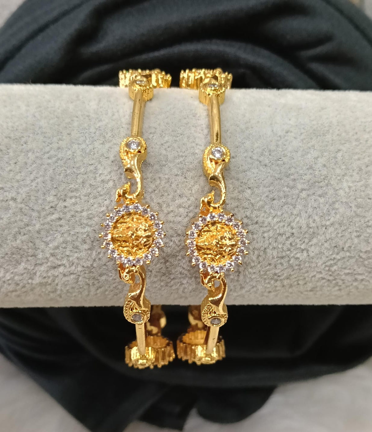 Gold plated AD bangle.