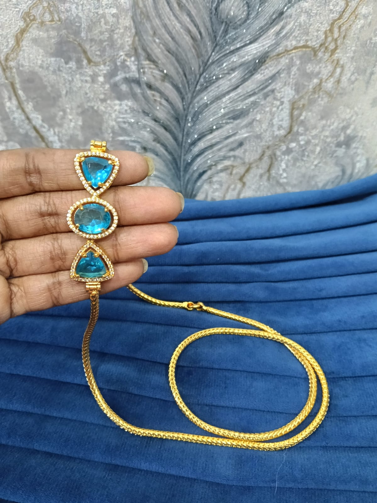 Mugappu chain.