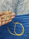 Gold look mugappu chain.