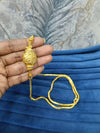 Gold look mugappu chain.
