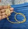 Gold look mugappu chain.