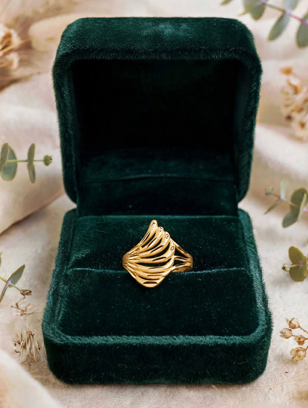 Gold plated adjustable ring.