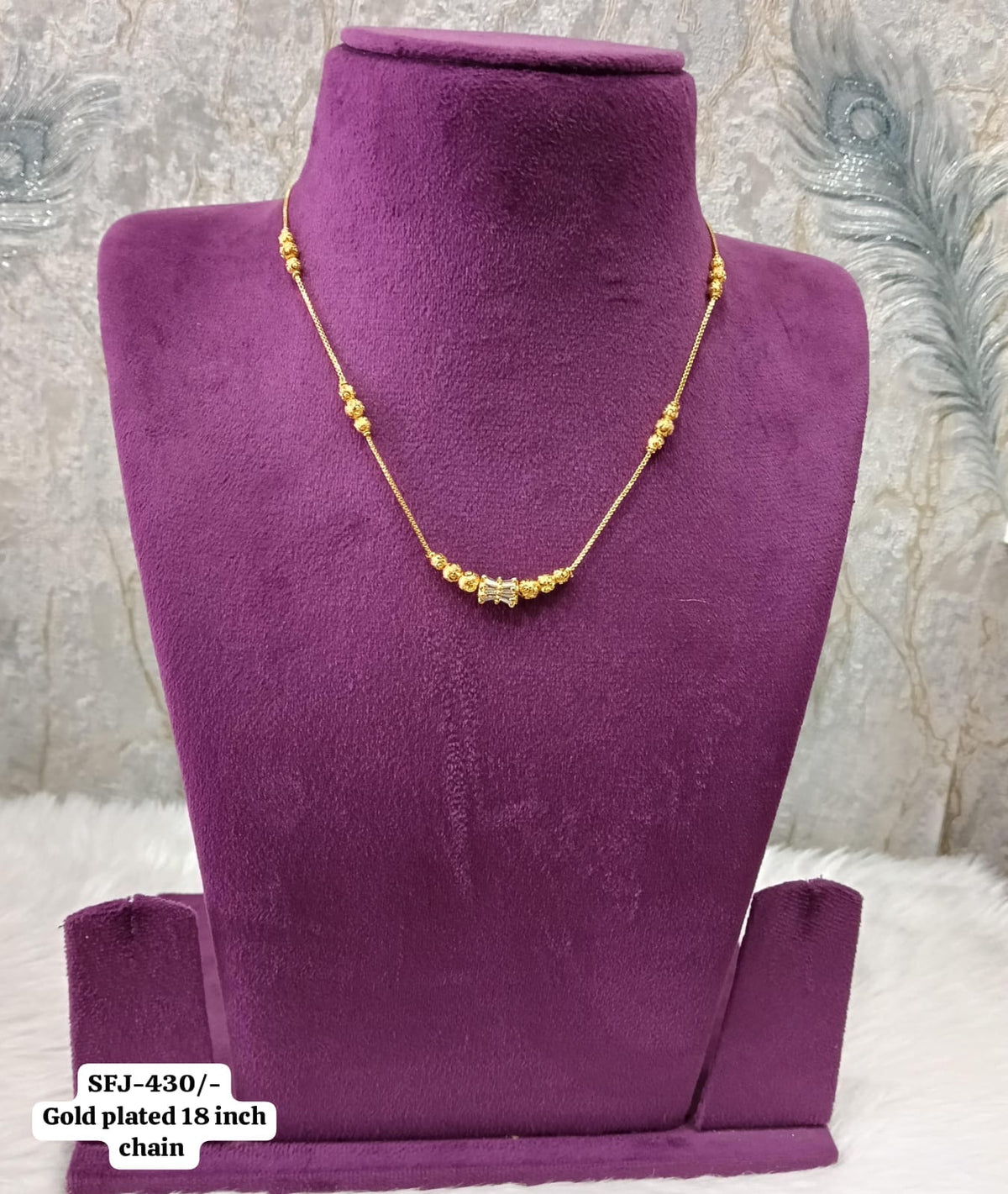 Gold plated necklace.