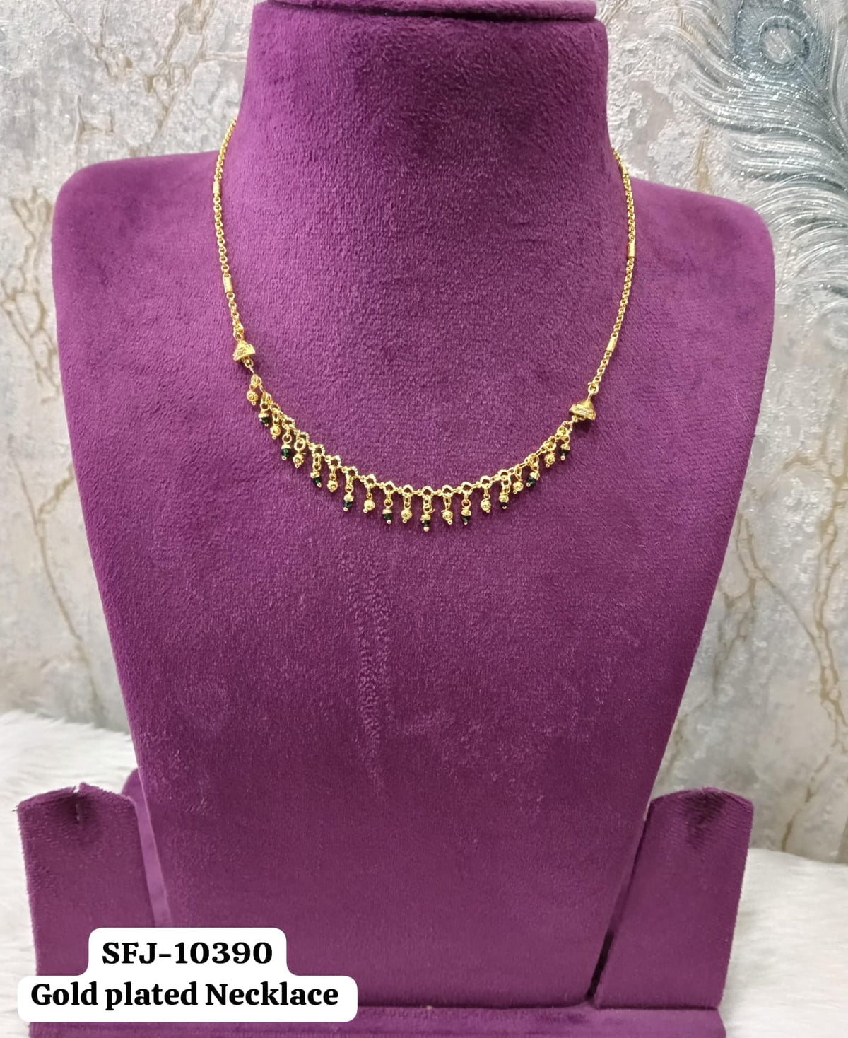 Gold plated necklace.