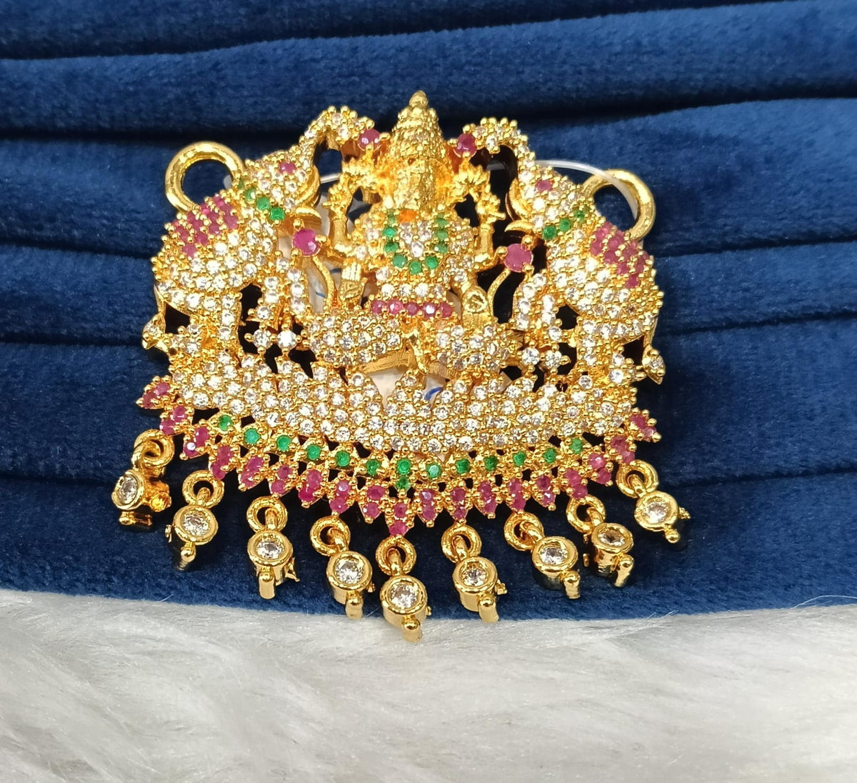 Gold plated AD pendant.