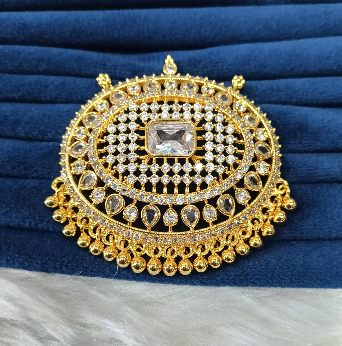 Gold plated AD pendant.