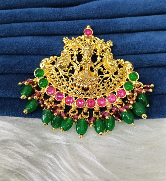 Gold plated pendant.