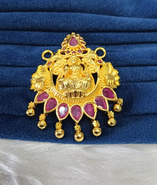Gold plated pendant.