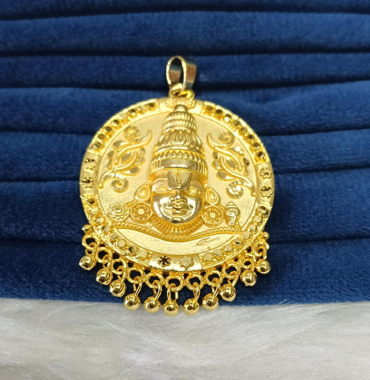 Gold plated pendant.